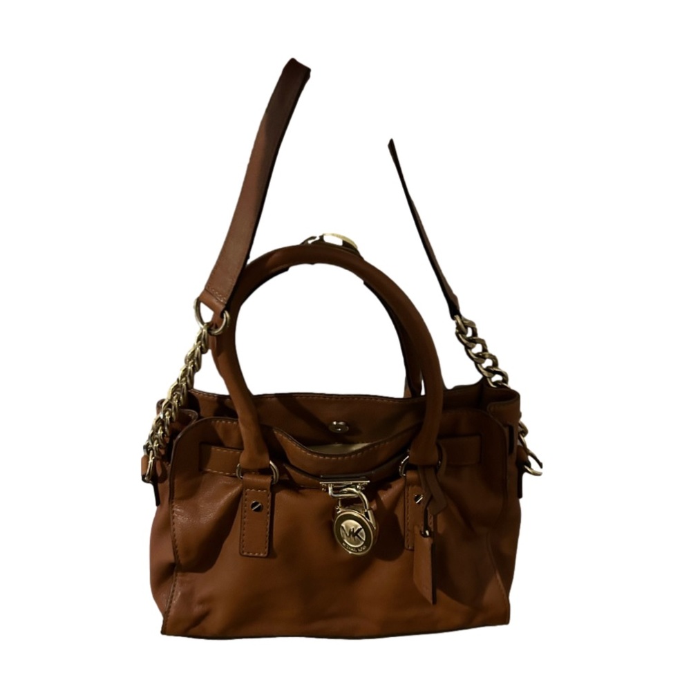 Michael Kors tan handbag.AP 1309